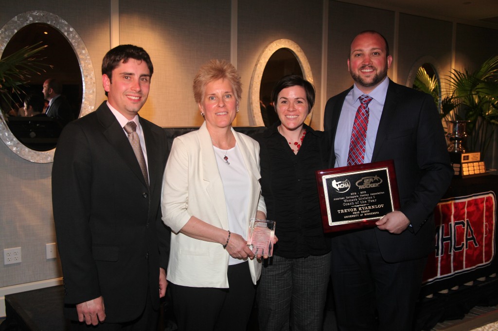 Trevor Kvarnlov ’08,  assistant coach Nicholas Hiipakka, women's hockey coach Jill Pohtilla, and Augsburg women’s hockey coach Michelle McAteer
