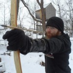 Cameron Cameron Christian-Weir wielding a bow and arrow