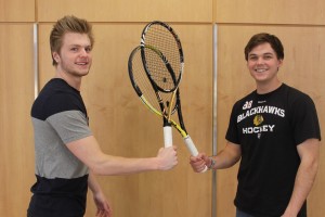 Two StepUP students with tennis rackets.