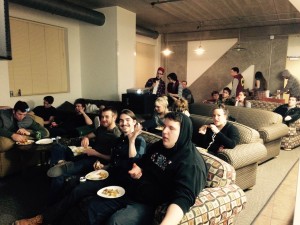 Photo of StepUP students enjoying food and the SuperBowl.