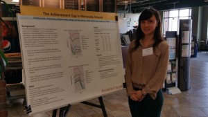 StepUP student in front of her presentation.