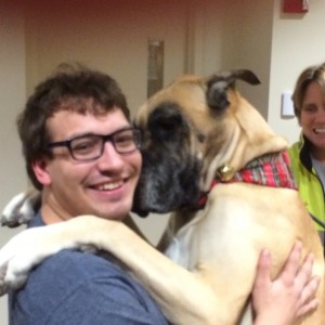 Blake H. with a dog.
