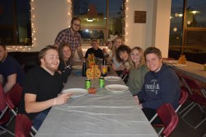 StepUP students sitting at table
